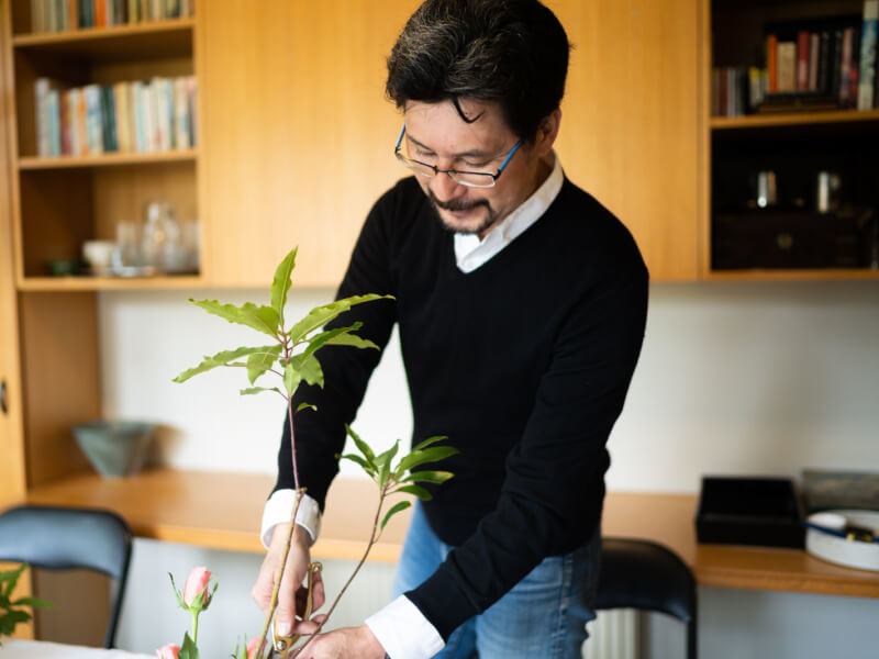 man arranging Ikebana
