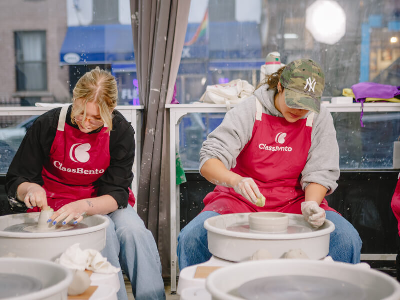 friends at a pottery class