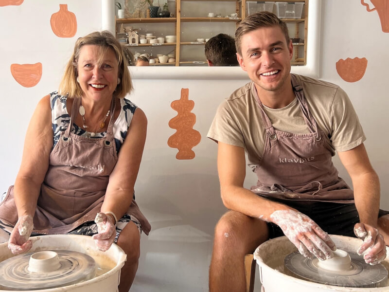 Two students enjoying a pottery class in the Klaypots studio