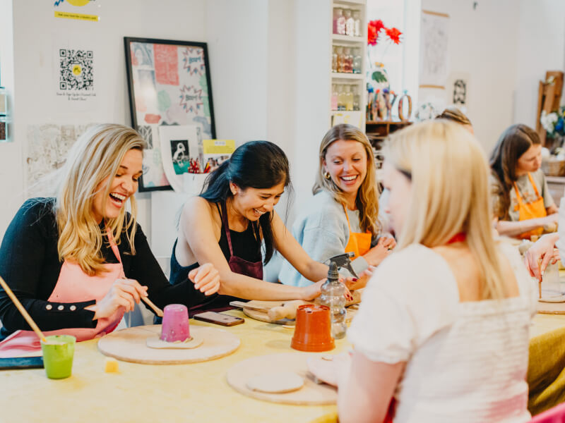 Woman enjoying a pottery class