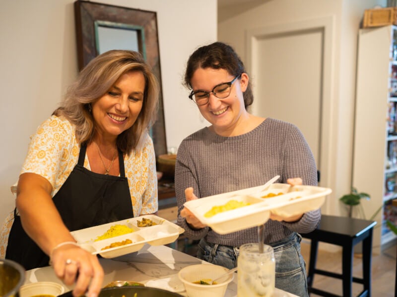 Women getting food on their plate