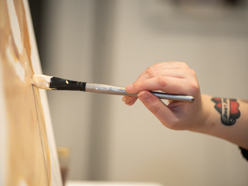 Hand painting a canvas