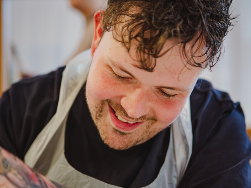 man smiling at unique experience