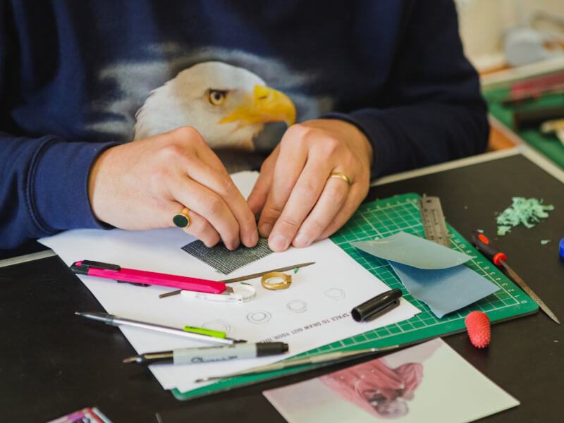 Silversmithing tools and hands on bench