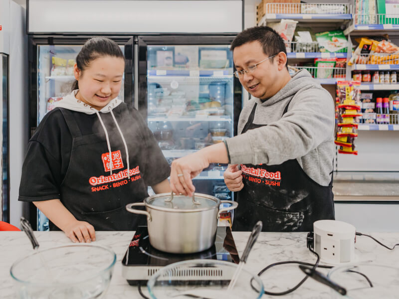 A husband and wife duo celebrating with a cooking class for two