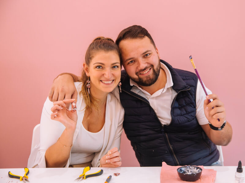couple making polymer clay jewellery