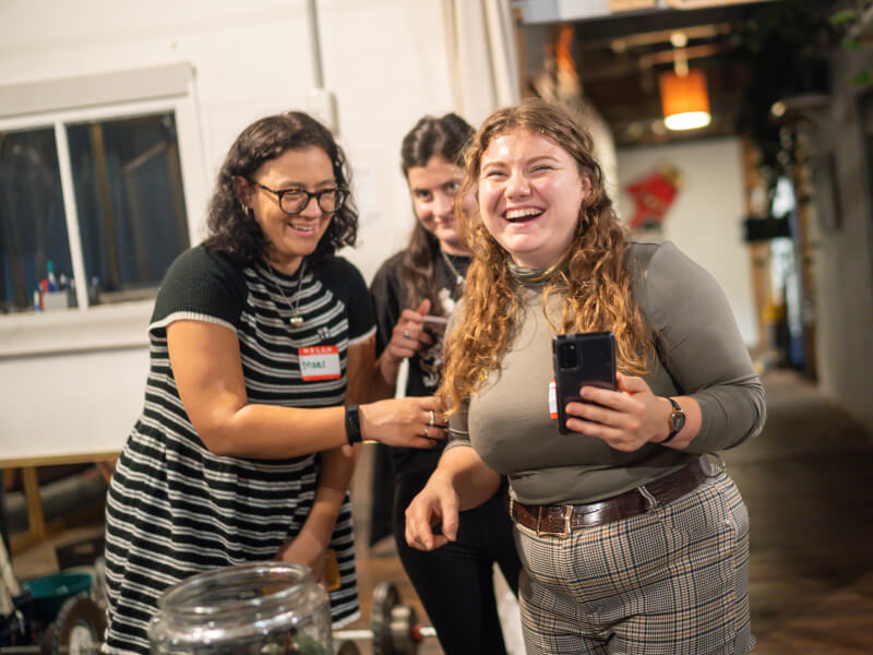 women laughing at terrarium workshop