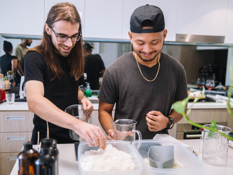 Men making candles