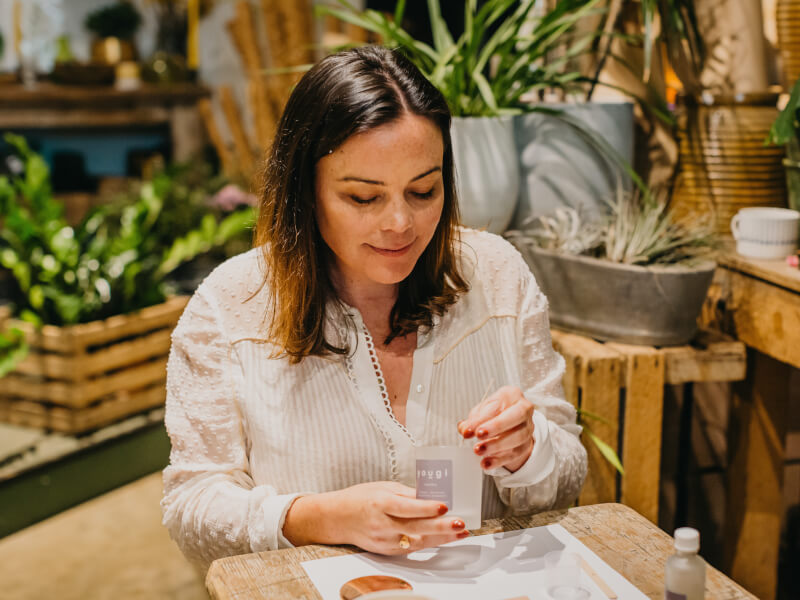 woman making diy candles