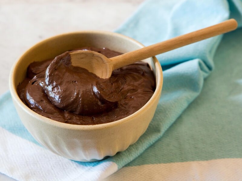 chocolate mix with wooden spoon