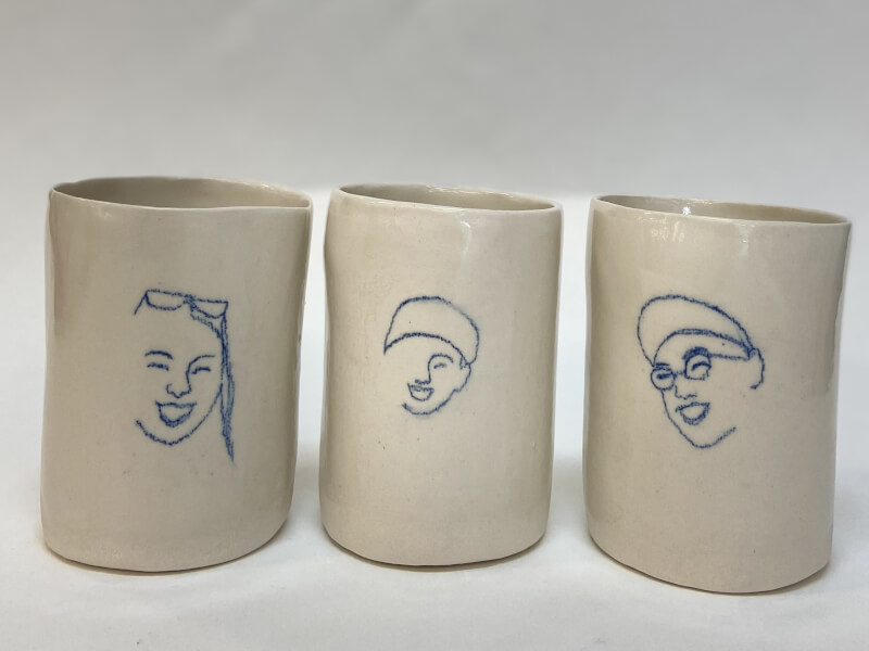 Ceramic mugs with blue illustration