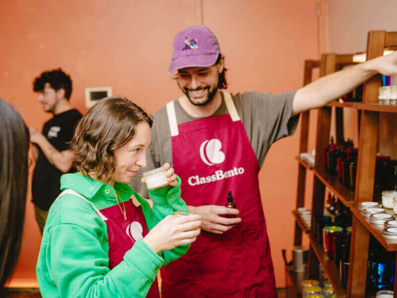A boyfriend and girlfriend make candles together