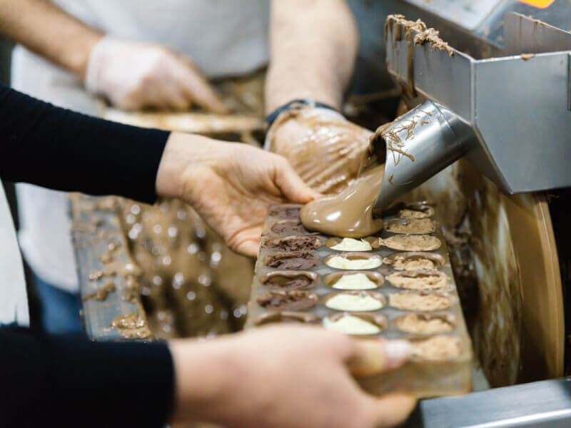 A close up of the chocolate making process
