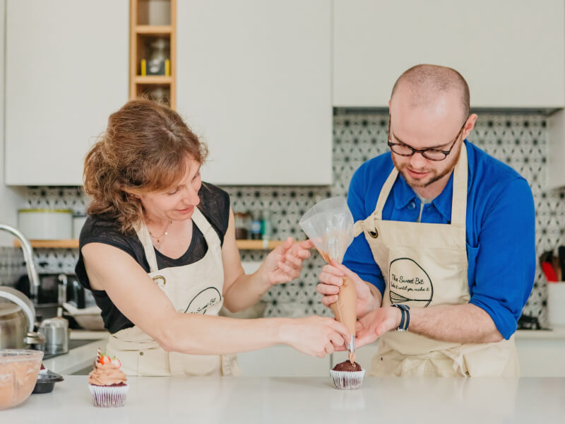 A mother and son baking together for Christmas