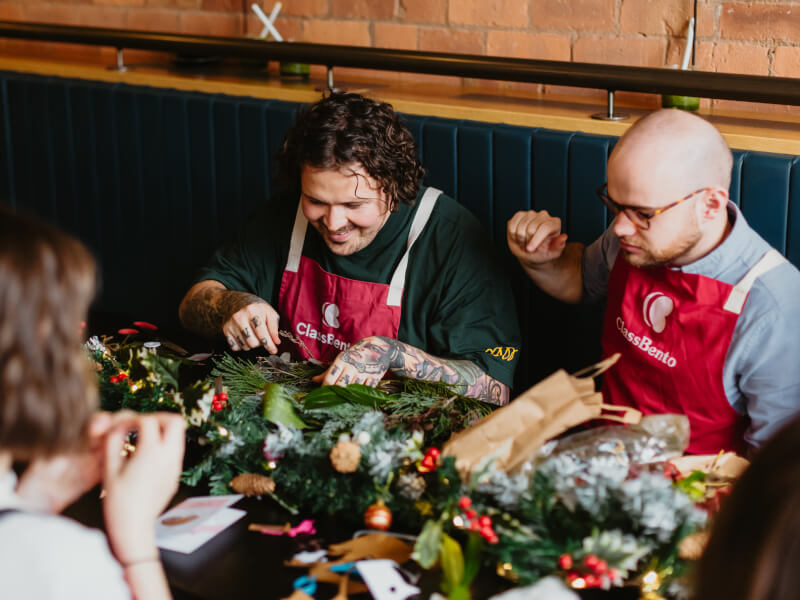 Two friends at a Christmas wreath class