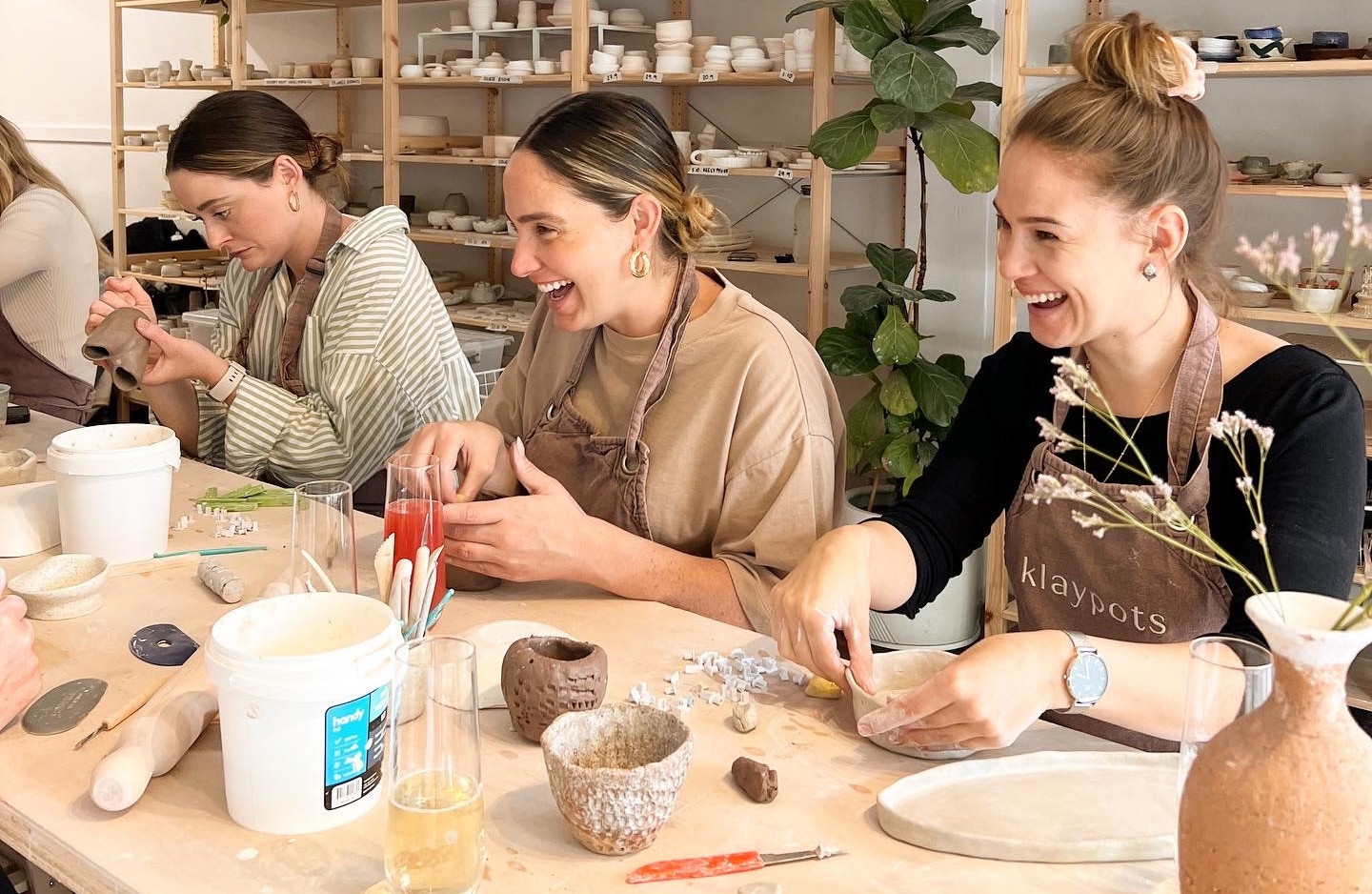 Women making their own pottery
