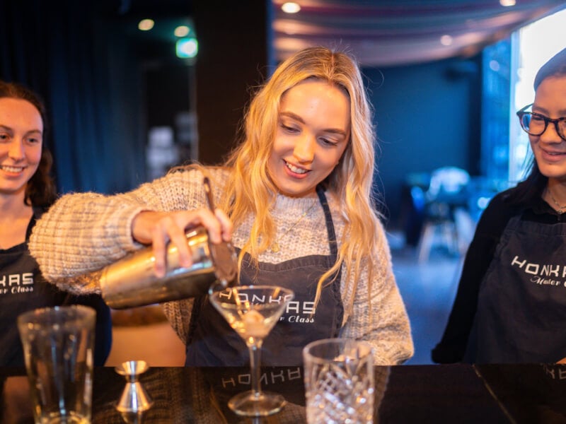 Friends celebrate Xmas with cocktail making