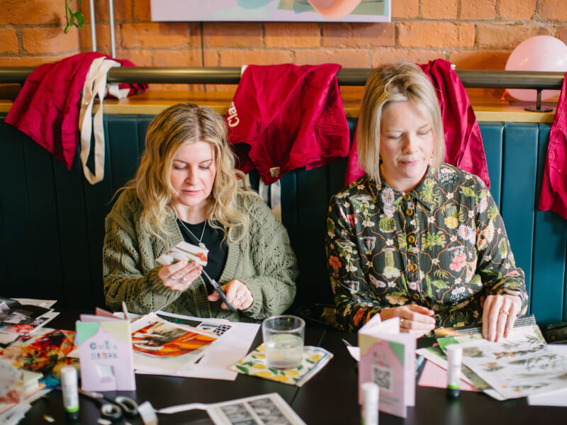 A couple make a relationship collage for Valentine's Day