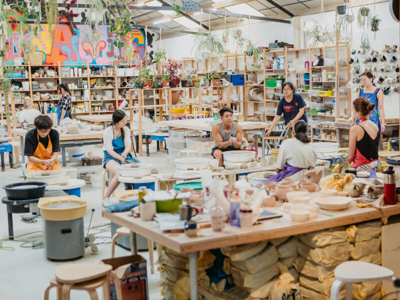 Colleagues enjoying a pottery class