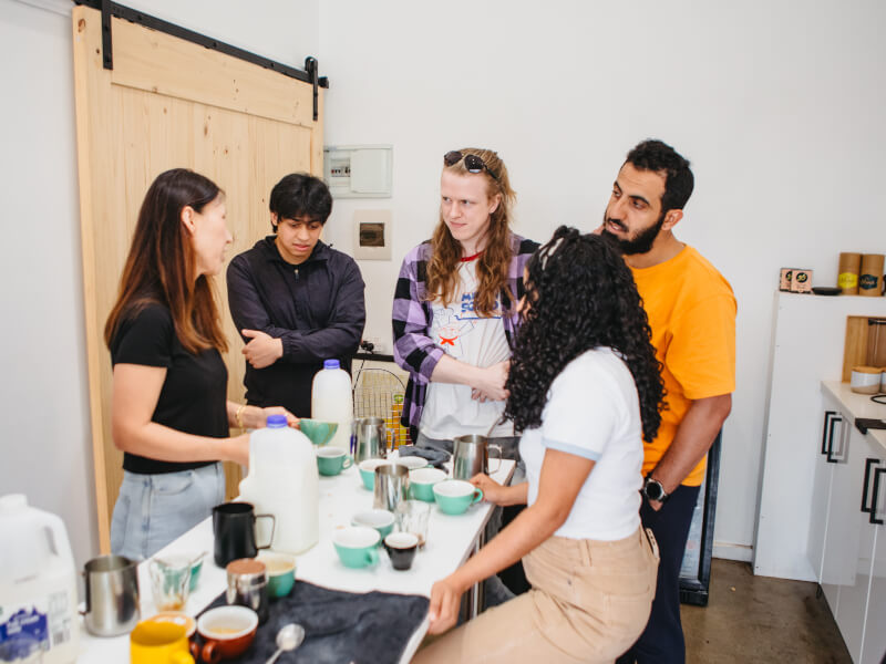 Colleagues attending coffee making workshop in Melbourne