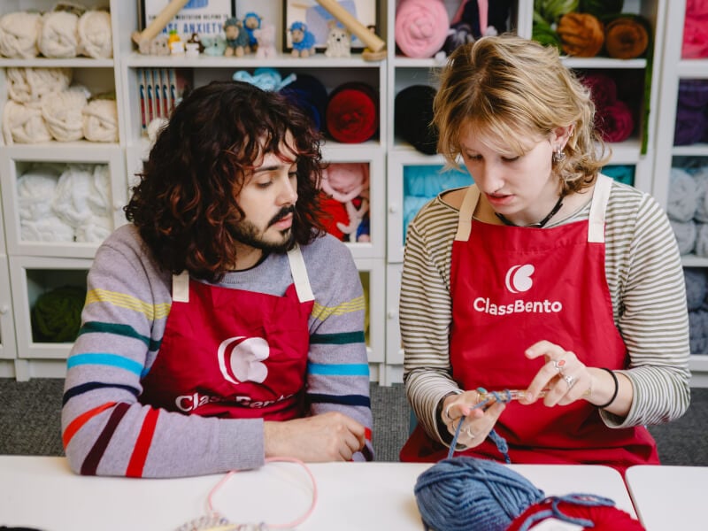 A couple enjoying a crochet birthday experience