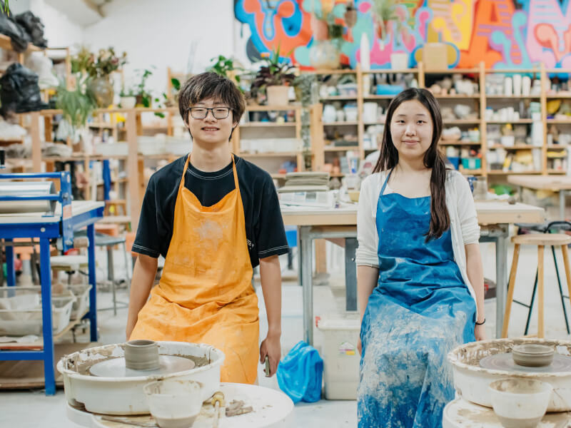 A couple at a wheelthrowing workshop on Vday
