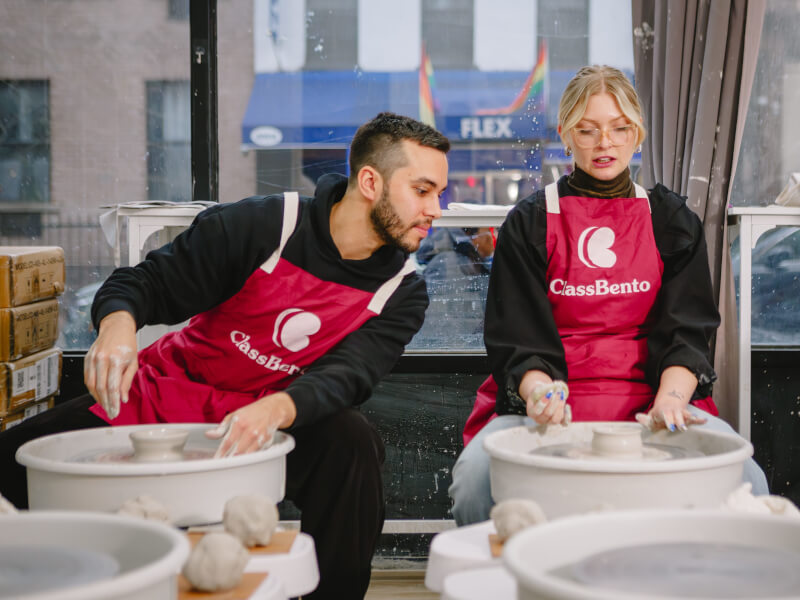 A wheel throwing DIY couple