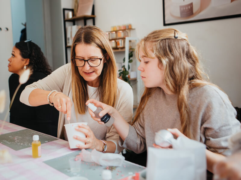 A young woman makes skincare for her mum