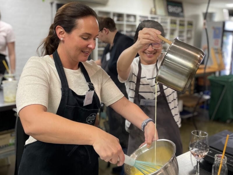two women making desserts
