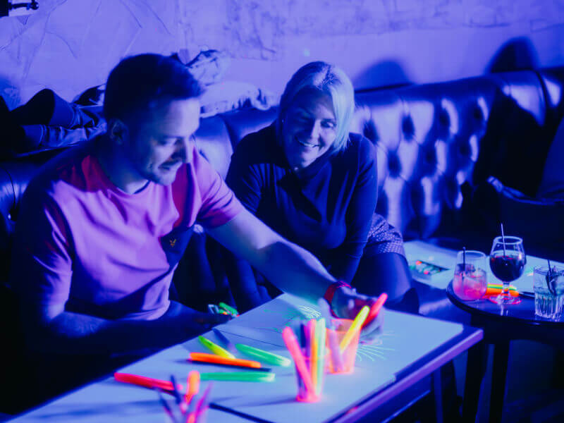 A neon paint and sip session