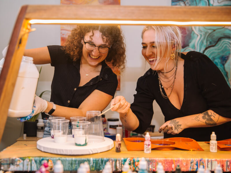 A teacher and student at an abstract art class