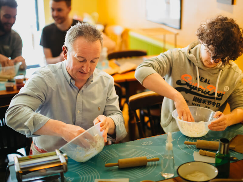 father and son pasta making class