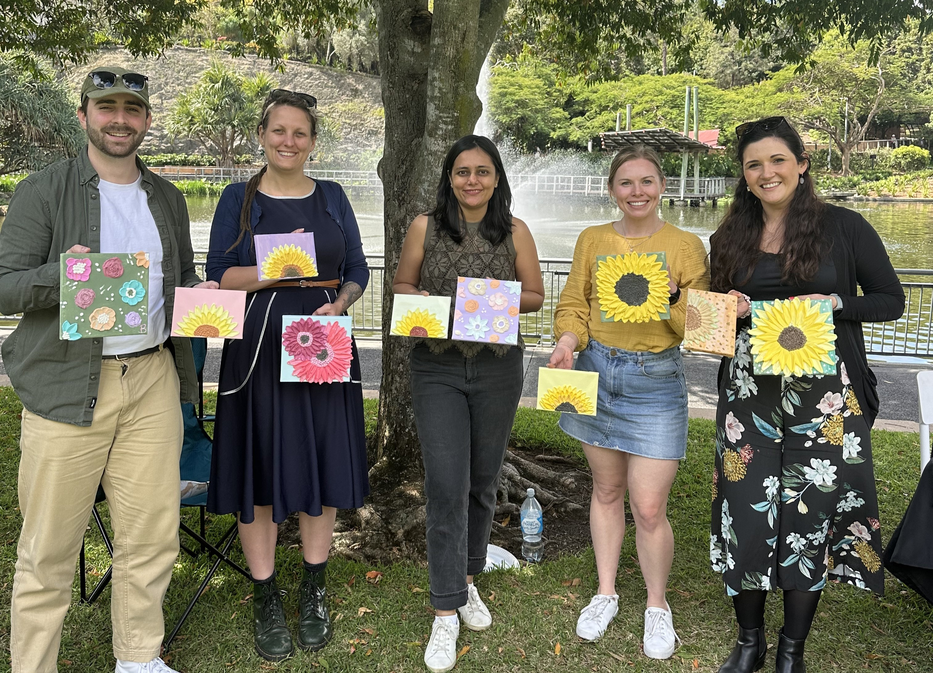 A group of friends with their textured artworks in Brisbane