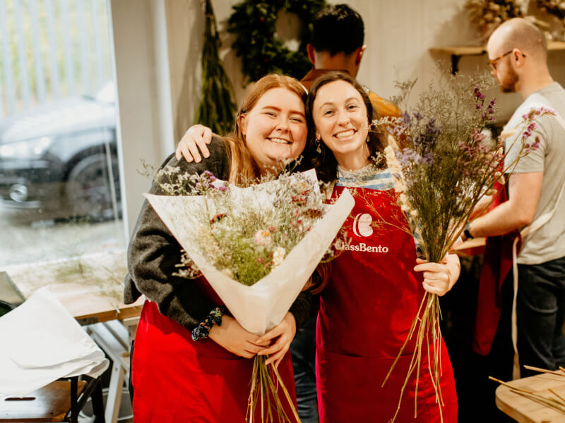 Couple celebrating their anniversary at a flower arranging class