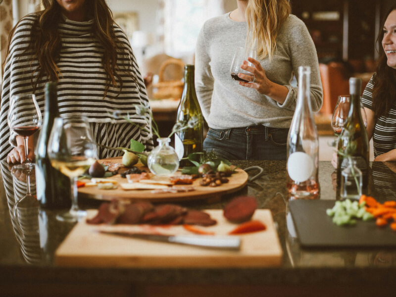 People enjoying food and wine
