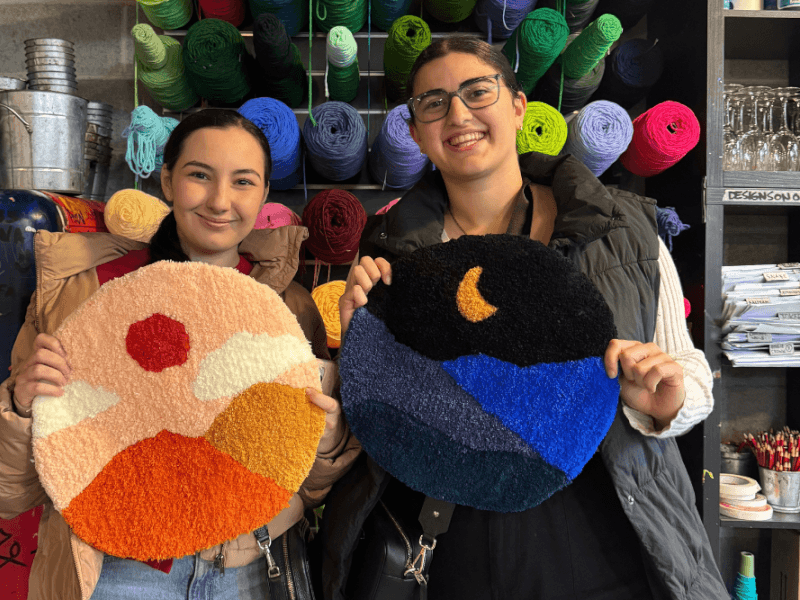 friends sharing their tufted rug creations