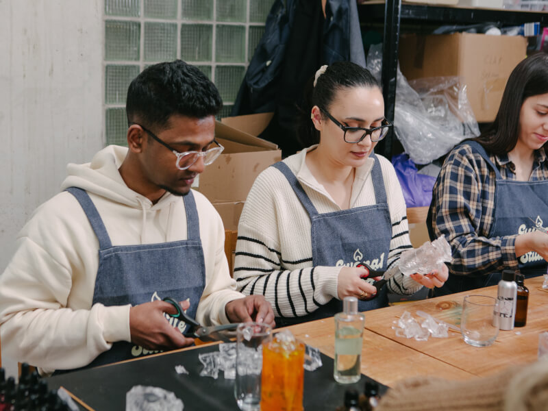 Friends celebrating a birthday at a candle making class
