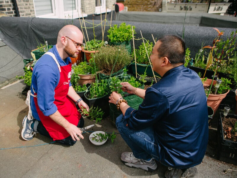 A man learns about plants at a gardening class