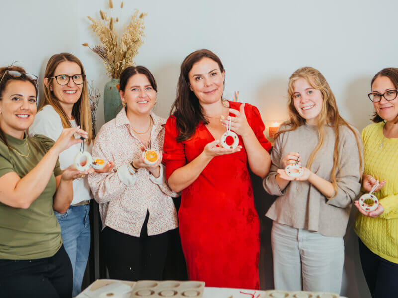 A group of friends with handmade Christmas soap