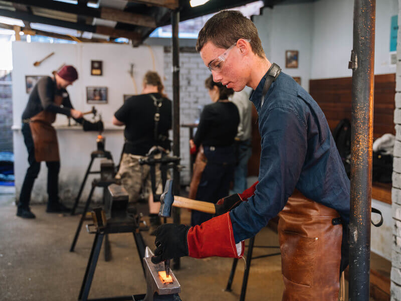 A man at a hands-on workshop