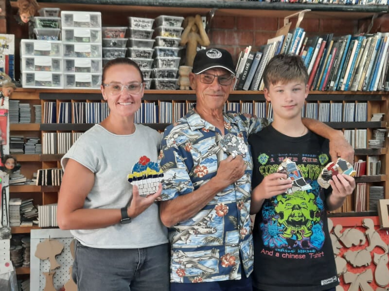 family taking a mosaic workshop