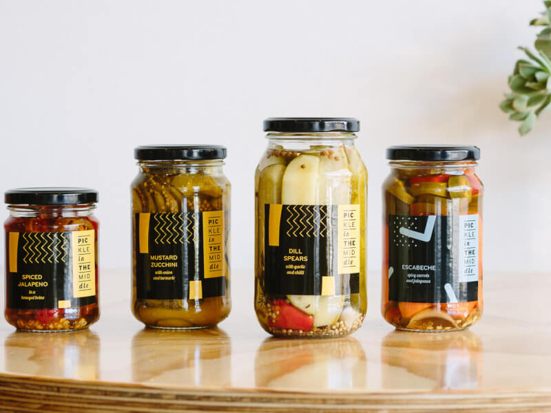 Four jars of pickles