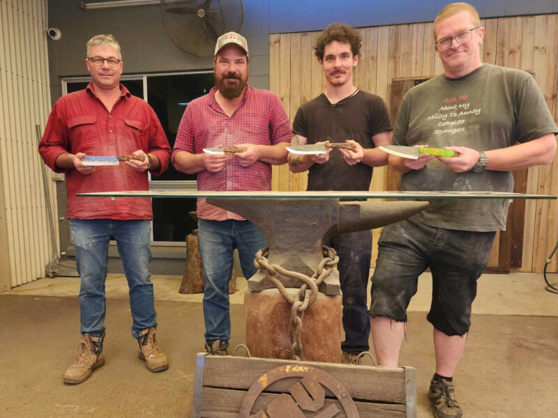 A gang of guys with their handmade knives