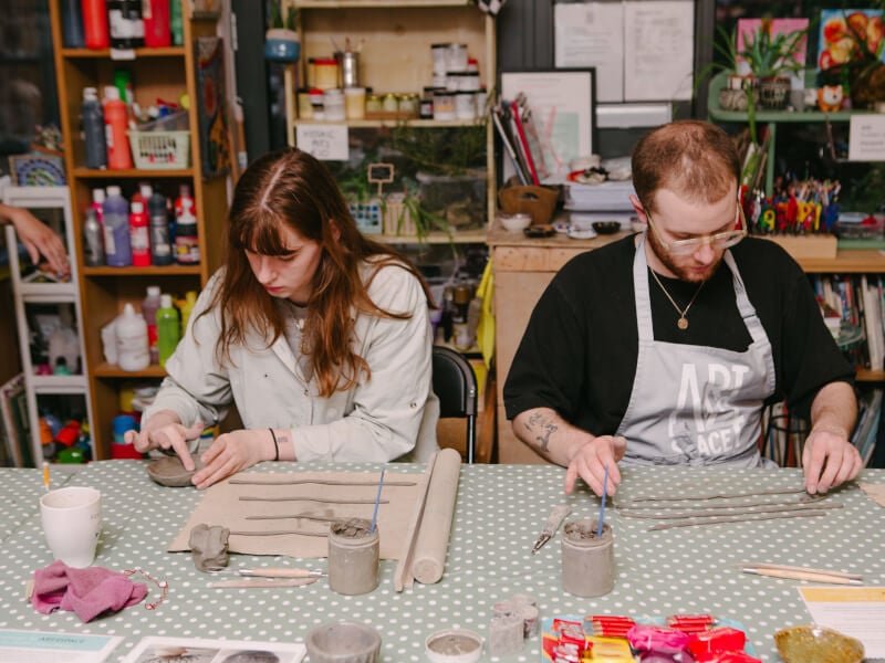 Man hand builds a mug with his girlfriend