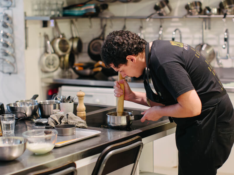 A man enjoying a cooking class