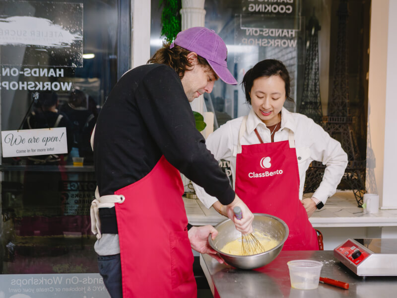 A man enjoys a cooking class he was gifted.