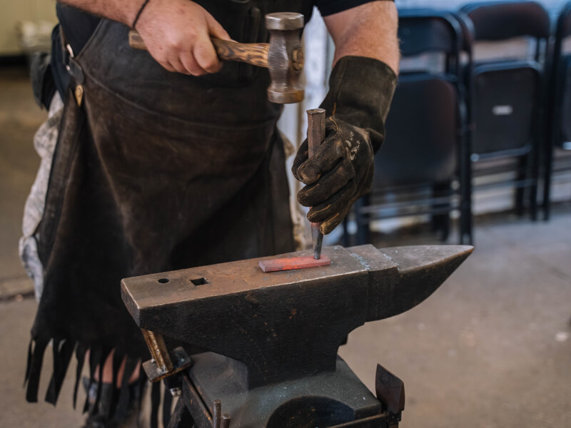 A metalsmithing anvil at a knife making workshop