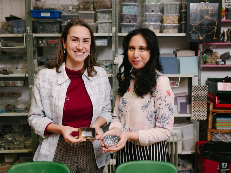 Women holding their Kintsugi pieces