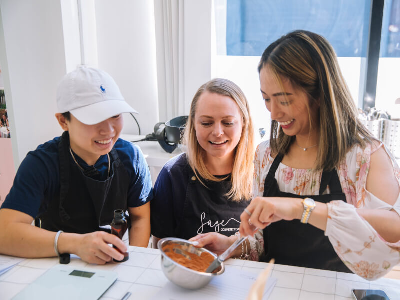 A mother and her son at a skincare making class together