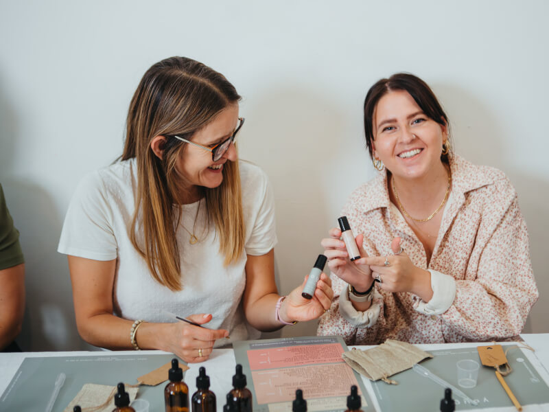 A mother and daughter making beauty products together for a birthday experience